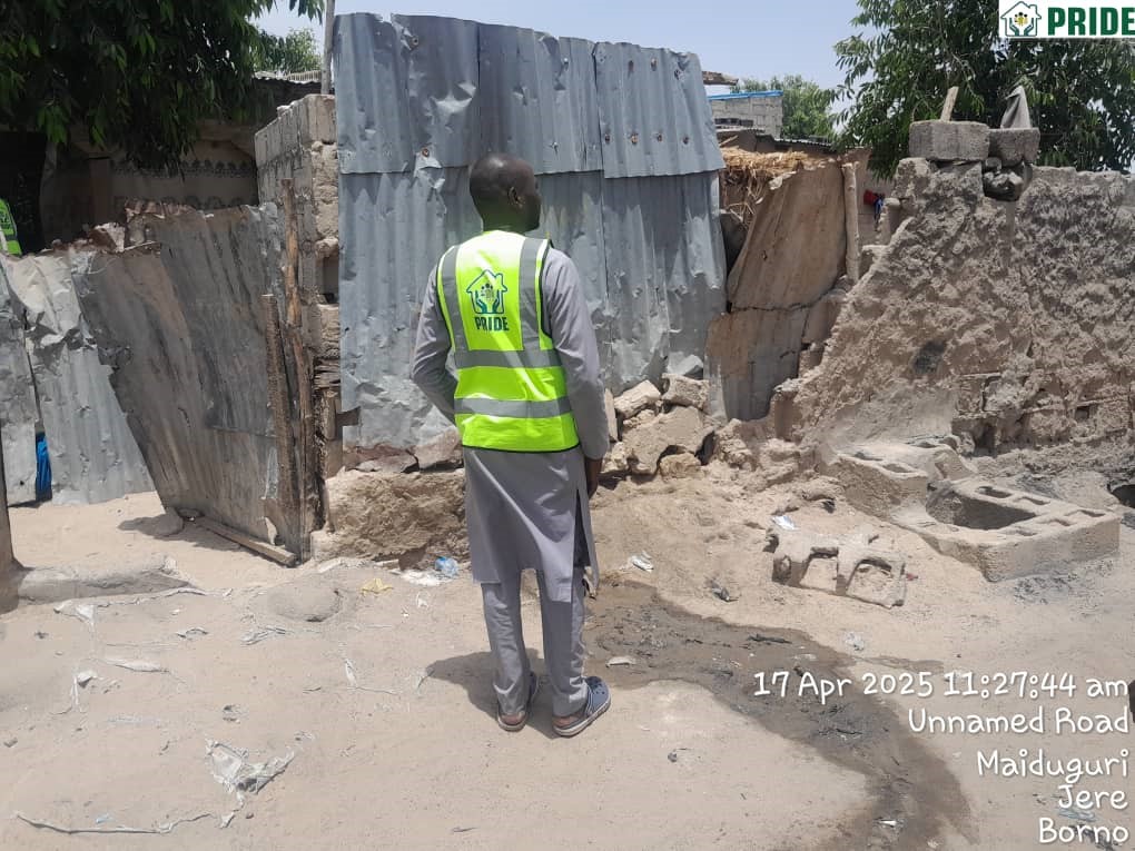 PRIDE assessing damaged houses destroyed by flood